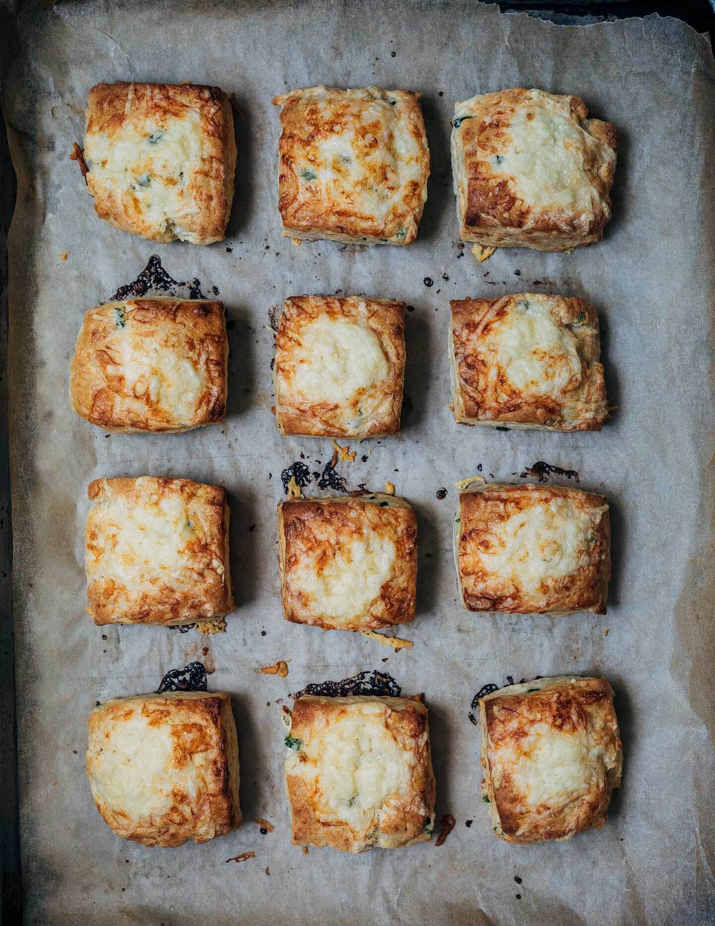 Baked biscuits on a baking sheet. 