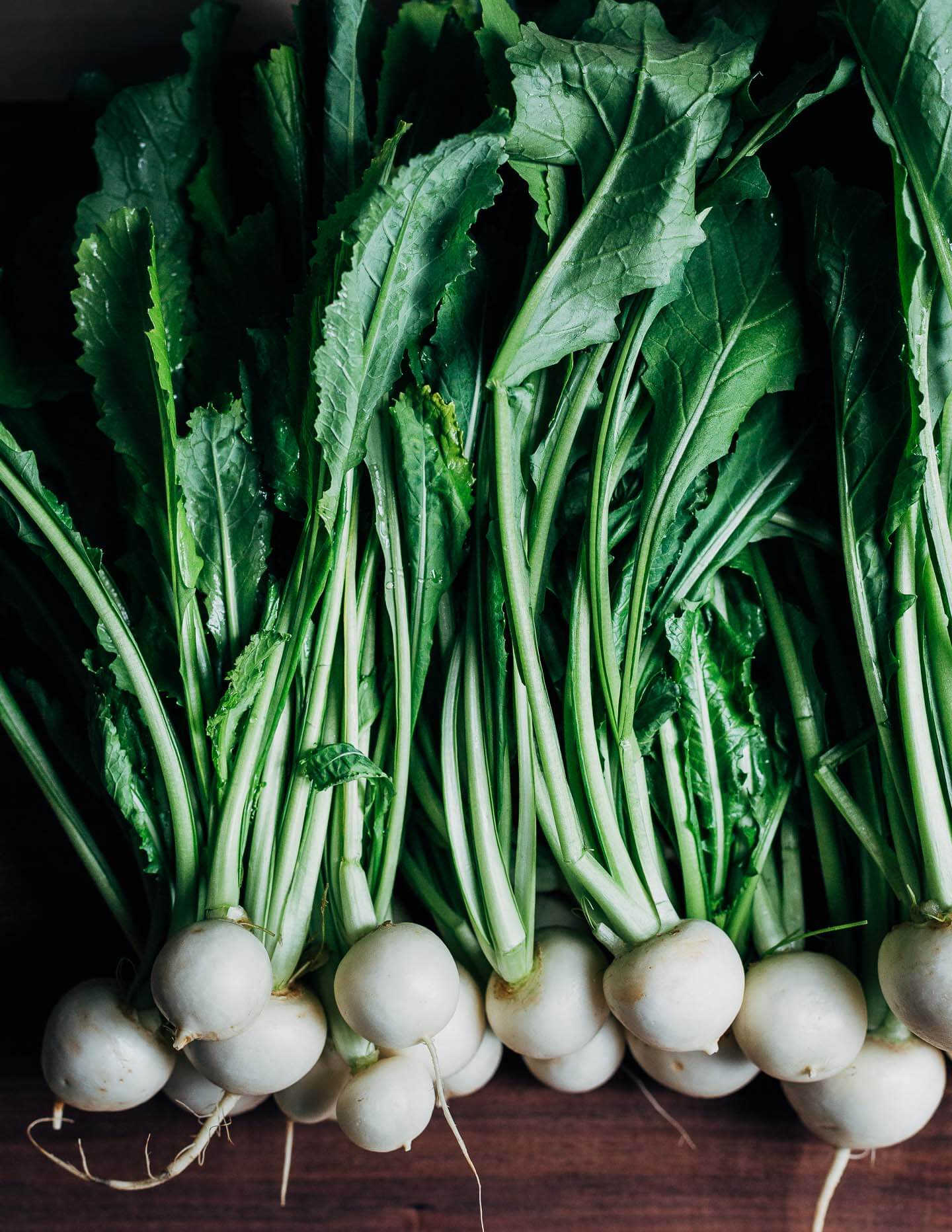 Hakurei turnips on a cutting board.