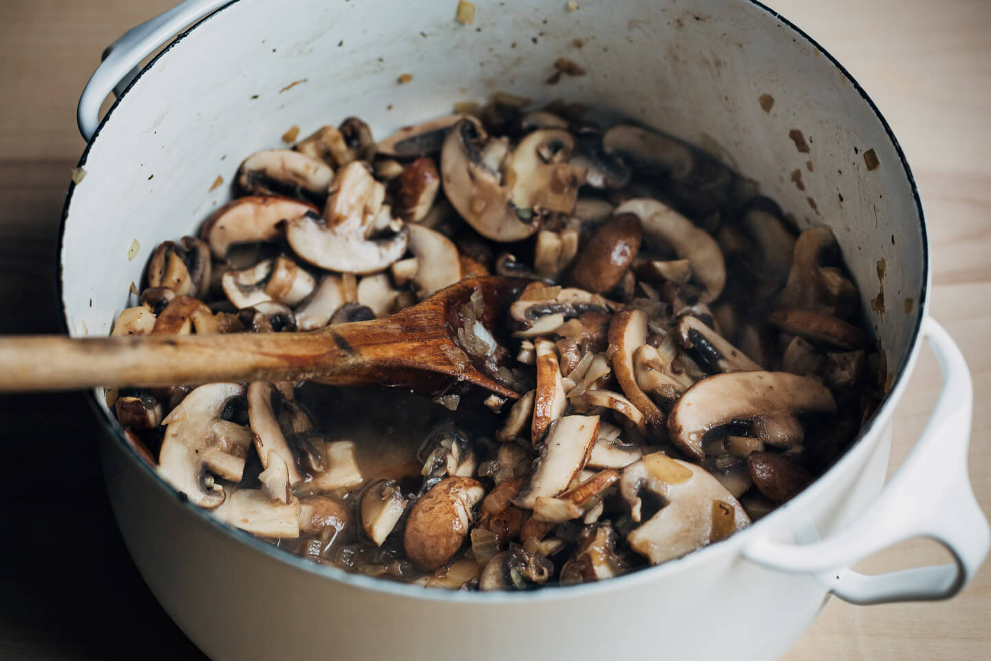A pot with cooked mushrooms for gravy. 